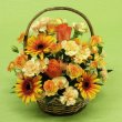愛知県津島市鈴木生花店の花　オレンジ・黄色のお花の　おまかせアレンジメント