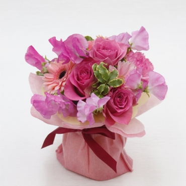 ピンクのバラを使用した花束(器付)
